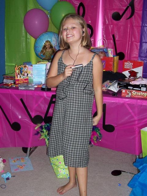 100_3074.JPG - Kaitlyn groovin' to the tunes on her new MP3 player.