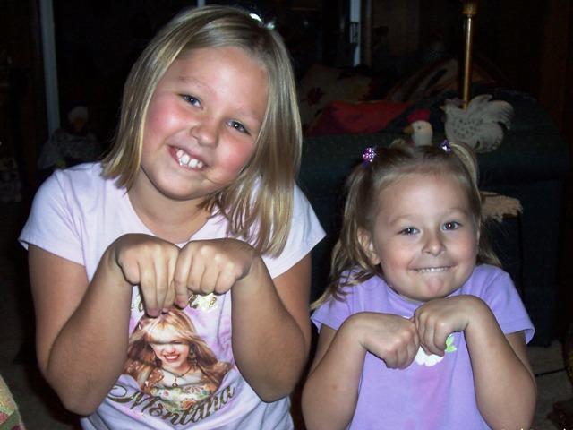 100_3101.JPG - Kaitlyn and Sydney being little chipmunks.