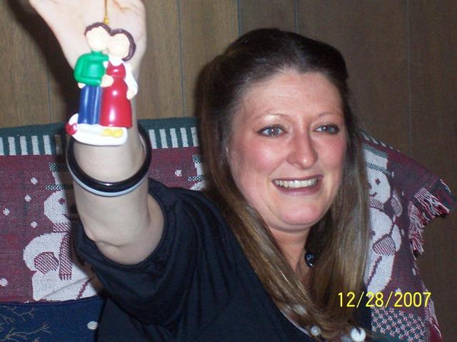 100_3410.JPG - Misty with a new ornament.