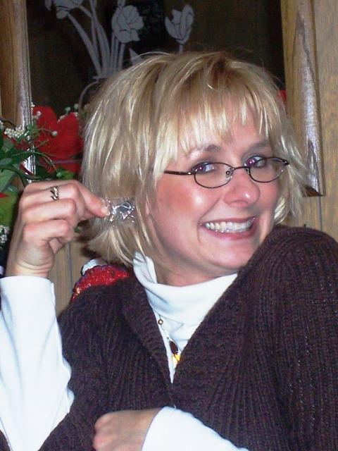 100_3423.JPG - Joy excited over new jewelry.