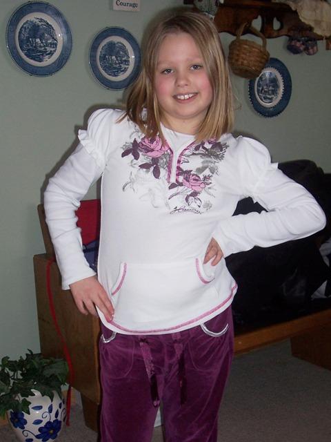 100_3439.JPG - Kaitlyn modeling one of her Christmas tops.