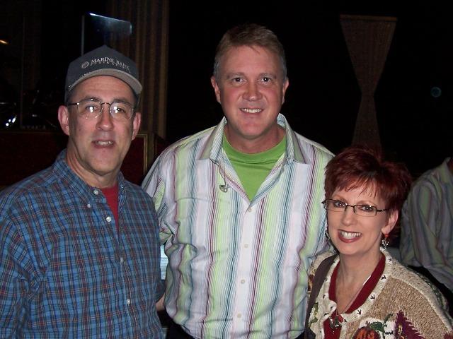 100_3132.JPG - Mark & Pam with lead singer Arthur Rice of the Kingdom Heirs.