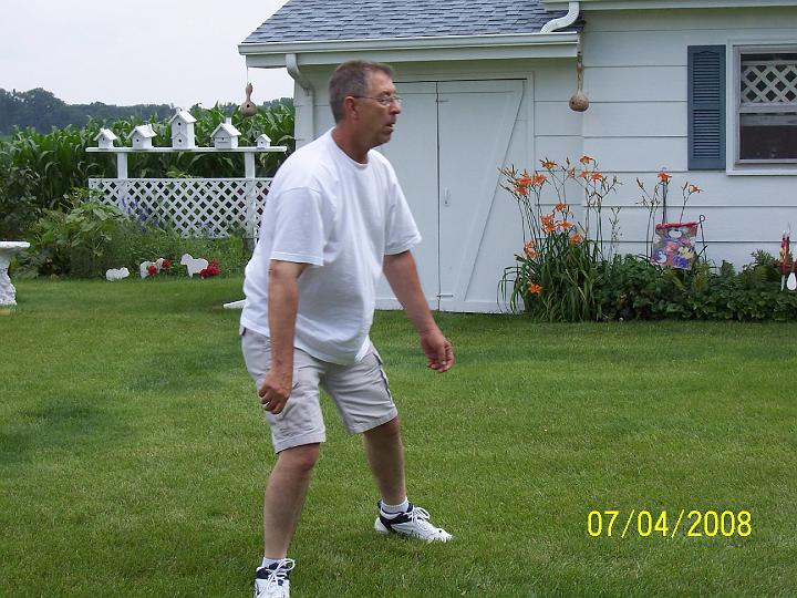 100_3806.JPG - Rick waiting to catch a hula-hoop.