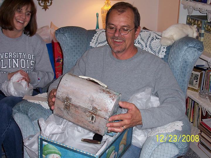100_4295.JPG - Jamie got Chet's old lunchbox that he used to take to work everyday.  It had about seven or eight layers of paint on it.