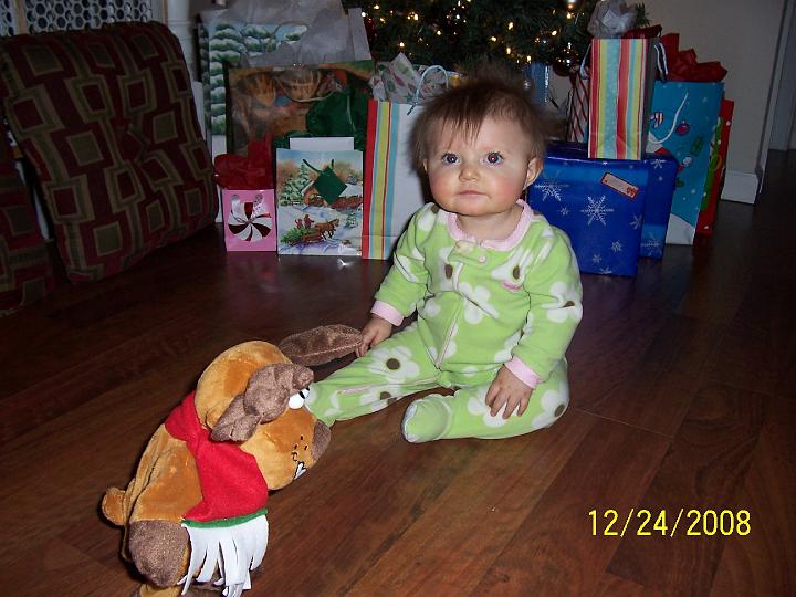 100_4314.JPG - Macie and the jumping singing reindeer.