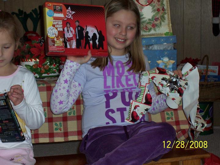100_4407.JPG - Katilyn with more gifts.