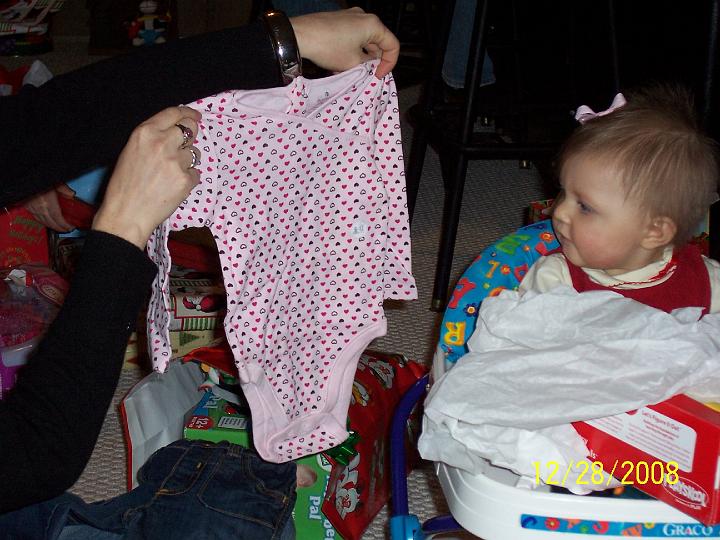 100_4408.JPG - Macie saying, "oh, no, more clothes?!?"