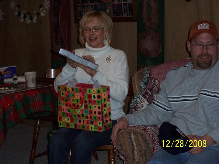 100_4460.JPG - Joy opening gifts.
