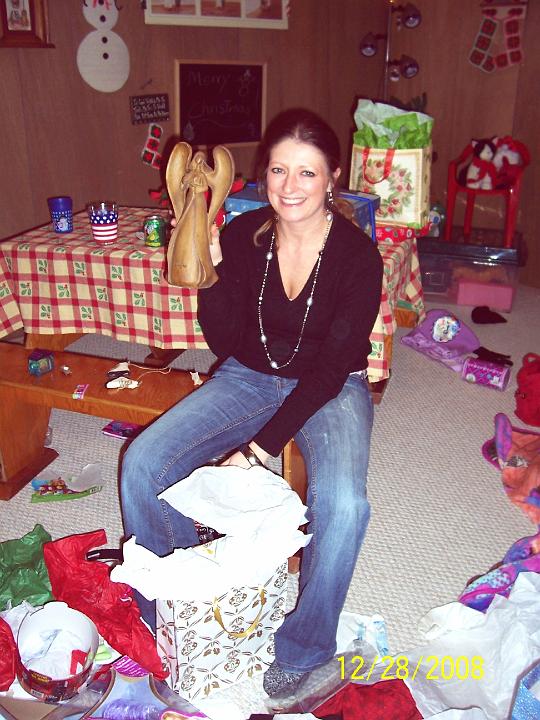 100_4471.JPG - Misty opening gifts.