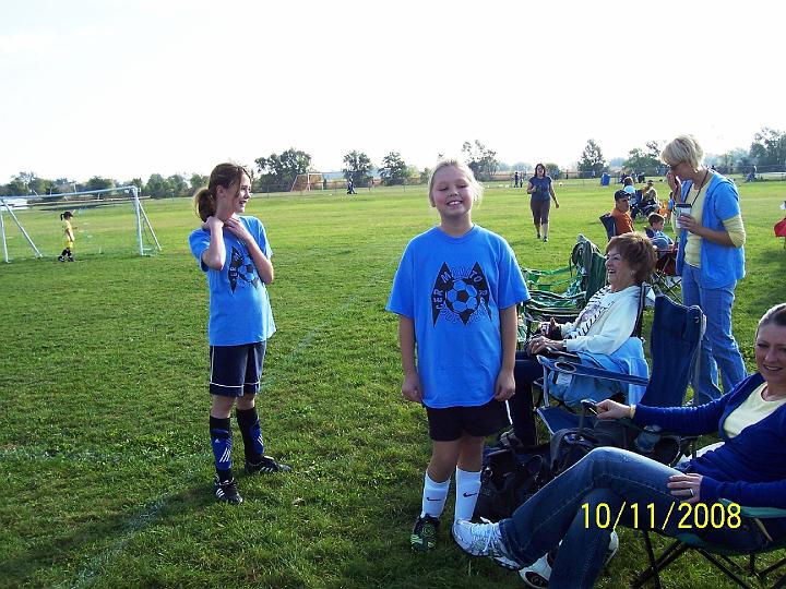 100_4060.JPG - Kaitlyn waiting for her game to start.