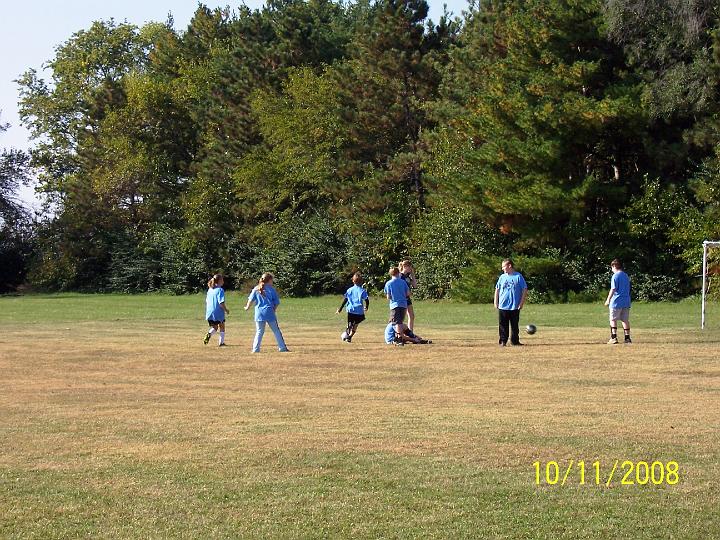 100_4063.JPG - Kaitlyn's team warming up.