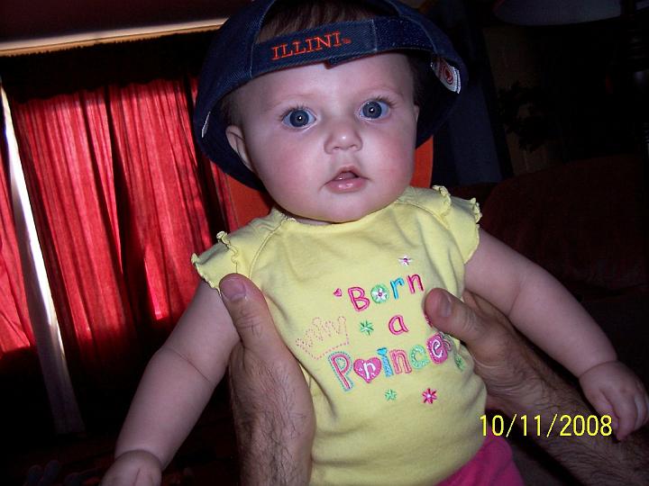 100_4090.JPG - Macie in Grandpa's hat.