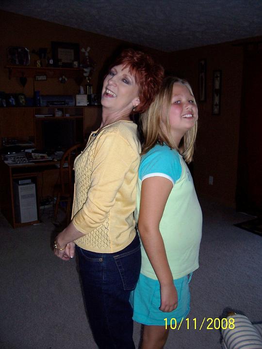 100_4093.JPG - Kaitlyn is almost as tall as Granny.