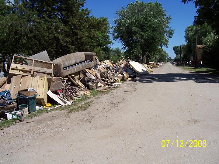 100_3829.JPG - Ruined furniture and belongings from flooded houses and river cabins at Shokokon, near Carman.