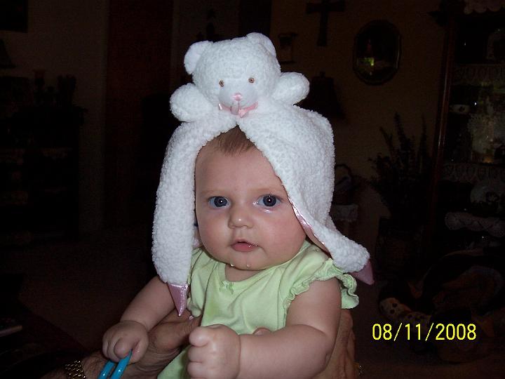 100_3848.JPG - Macie with her bear towel-puppet.