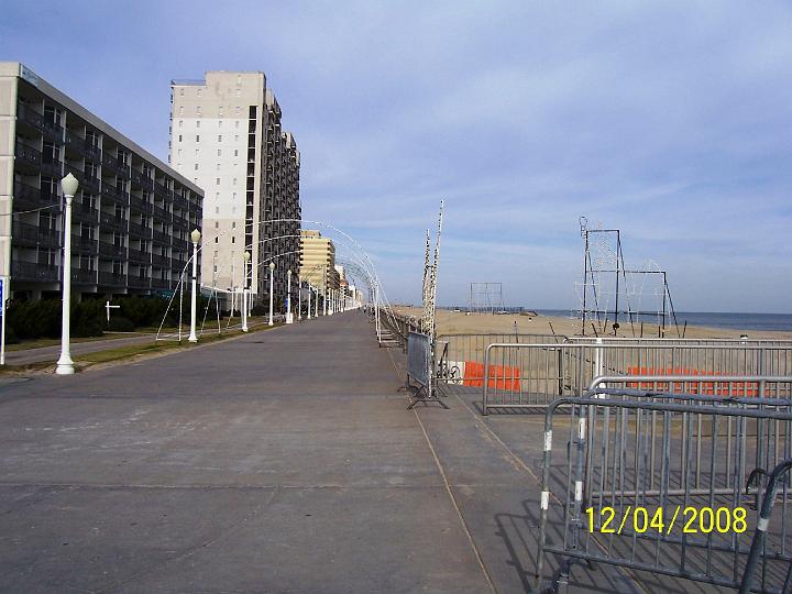 100_4202.JPG - A deserted view of Virginia Beach.  The "boardwalk" was decorated as a festival of lights for the Christmas season.  It sure doesn't look like much during the day, but I'll bet it was beatiful in the evening.  During the summer months, the hotels and beach are full.