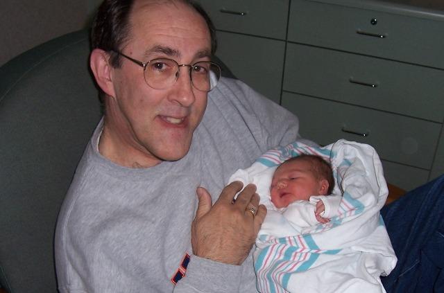 100_3577.JPG - Grandpa Mark gets in on the baby action.