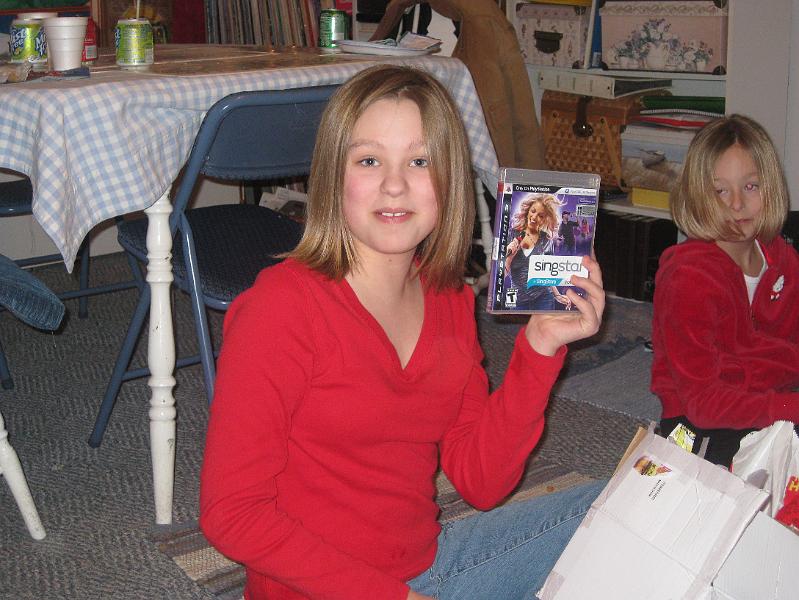 IMG_1223.JPG - Kaitlyn go a "Singstar" module for her Playstation.