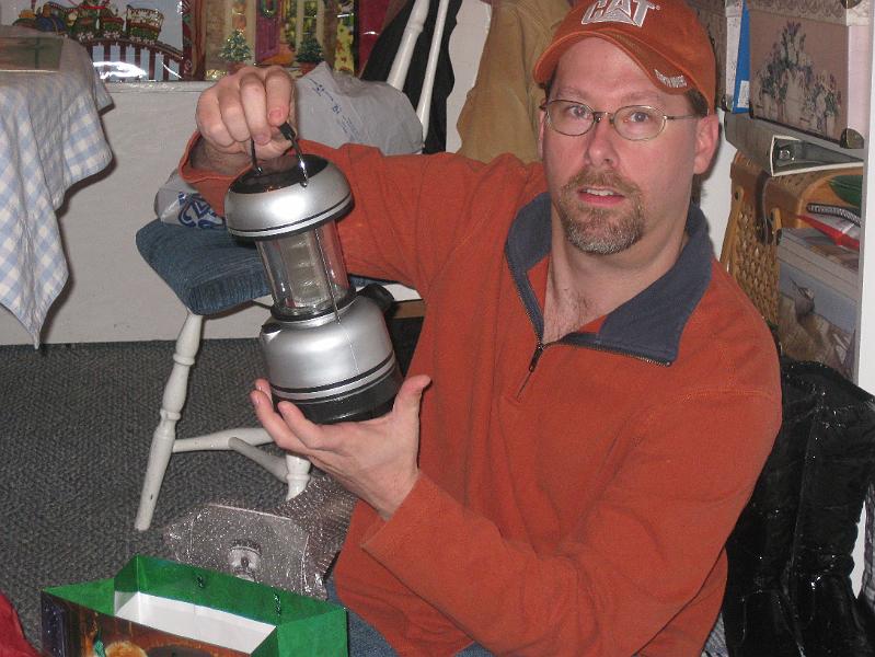 IMG_1230.JPG - All the Gilbert grandsons and grandsons-in-law got LED lanterns this year.  Here's Don showing his.