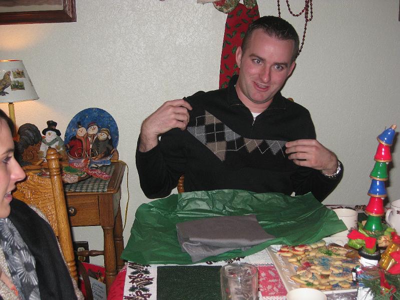 IMG_1356.JPG - Drew shows off his new argyle socks and t-shirt.