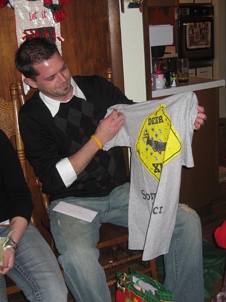 IMG_1357.JPG - Trevor wiith his hunting shirt: "Sorry, I see deer, I shoot ..."