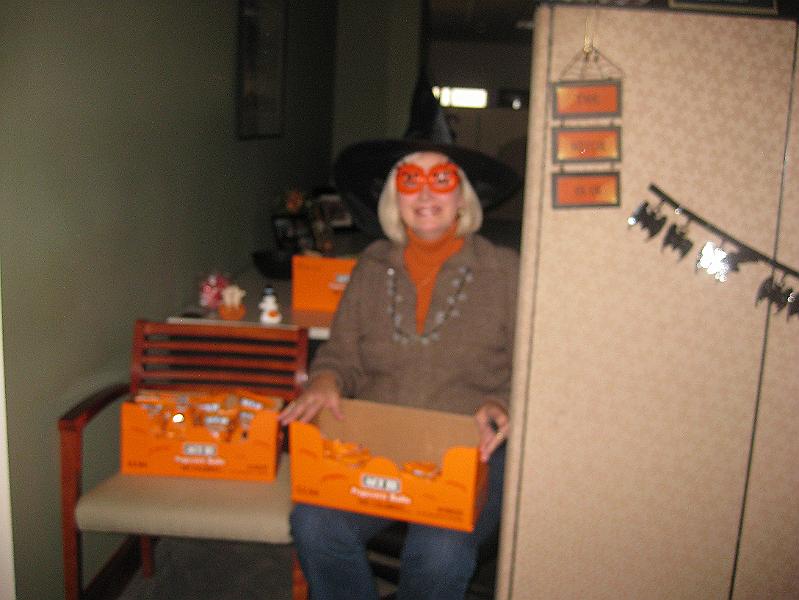 IMG_1105.JPG - Edna handing out goodies in the commerical lending department.