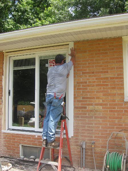 IMG_0829.JPG - The new door is framed in and getting exterior trim.