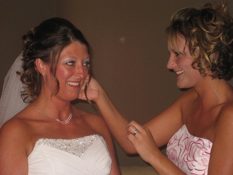 IMG_0670.JPG - Here, let's get these earrings in now.