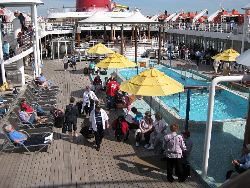 IMG_0023.JPG - Looking down on the Lido deck as more passengers arrive.