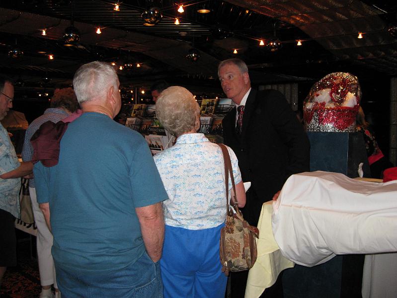 IMG_0108.JPG - The artists all set up their booths in the casino.  It was strange seeing gospel music sold among shut-down slot machines.  Here's Clayton Inman of the Triumphant Quartet.