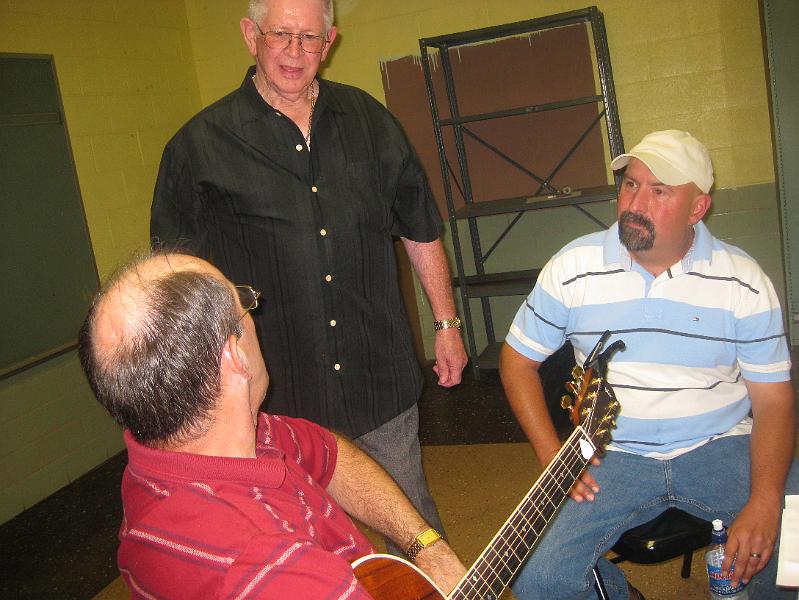 IMG_0885.JPG - Mark and Ron Devore discuss the old days at the Mason City opry with one of the other entertainers.
