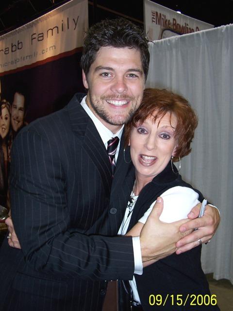 100_2240.JPG - Jason Crabb surprised Pam with a hug.  (Pam told me not to post this picture!)